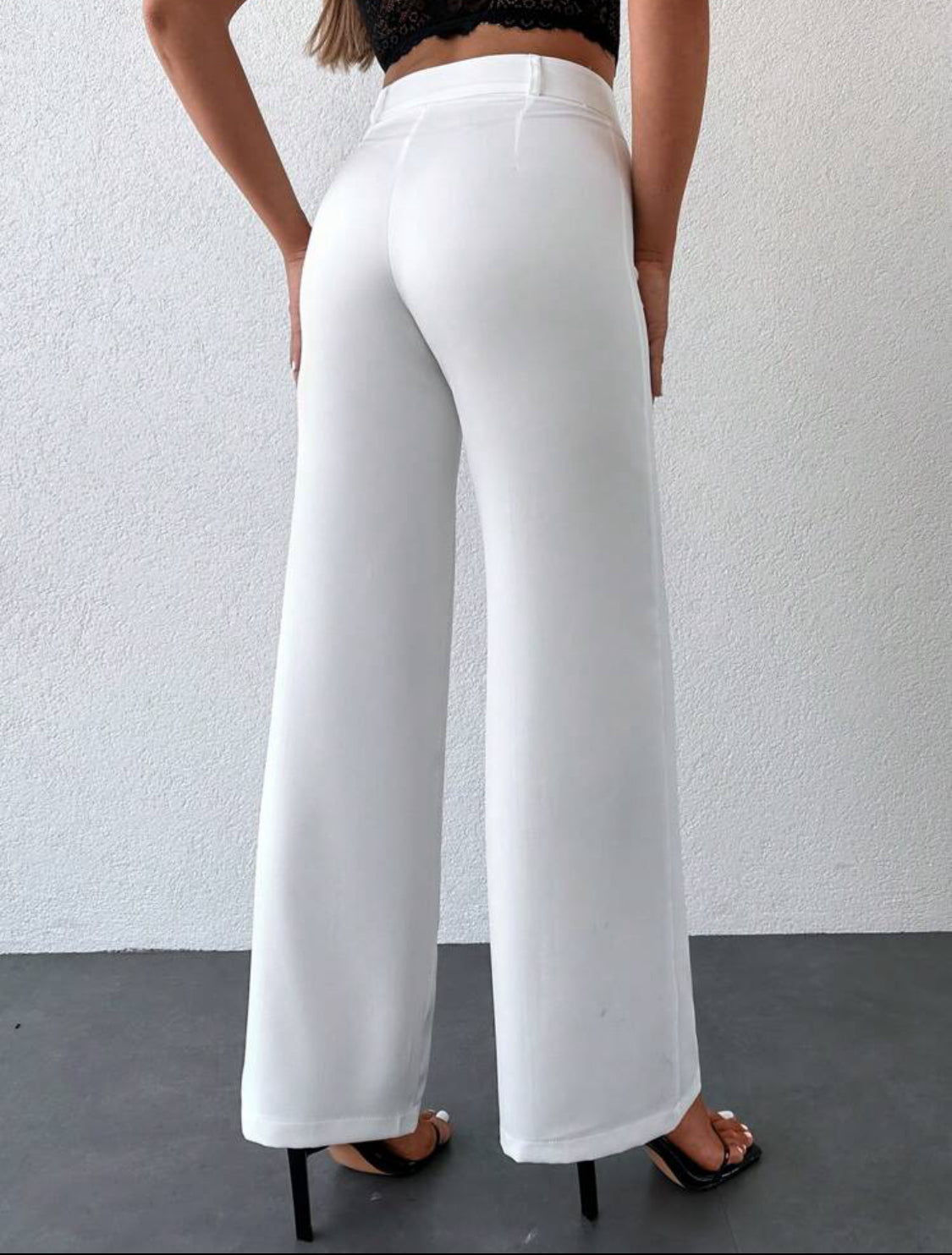 Pantalon blanc à pied large avec braguette zippée sans ceinture