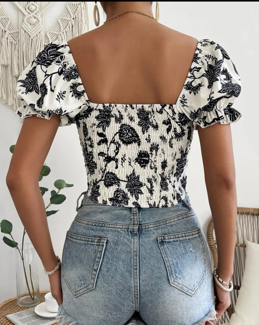 Blouse fleurie à manches bouffantes